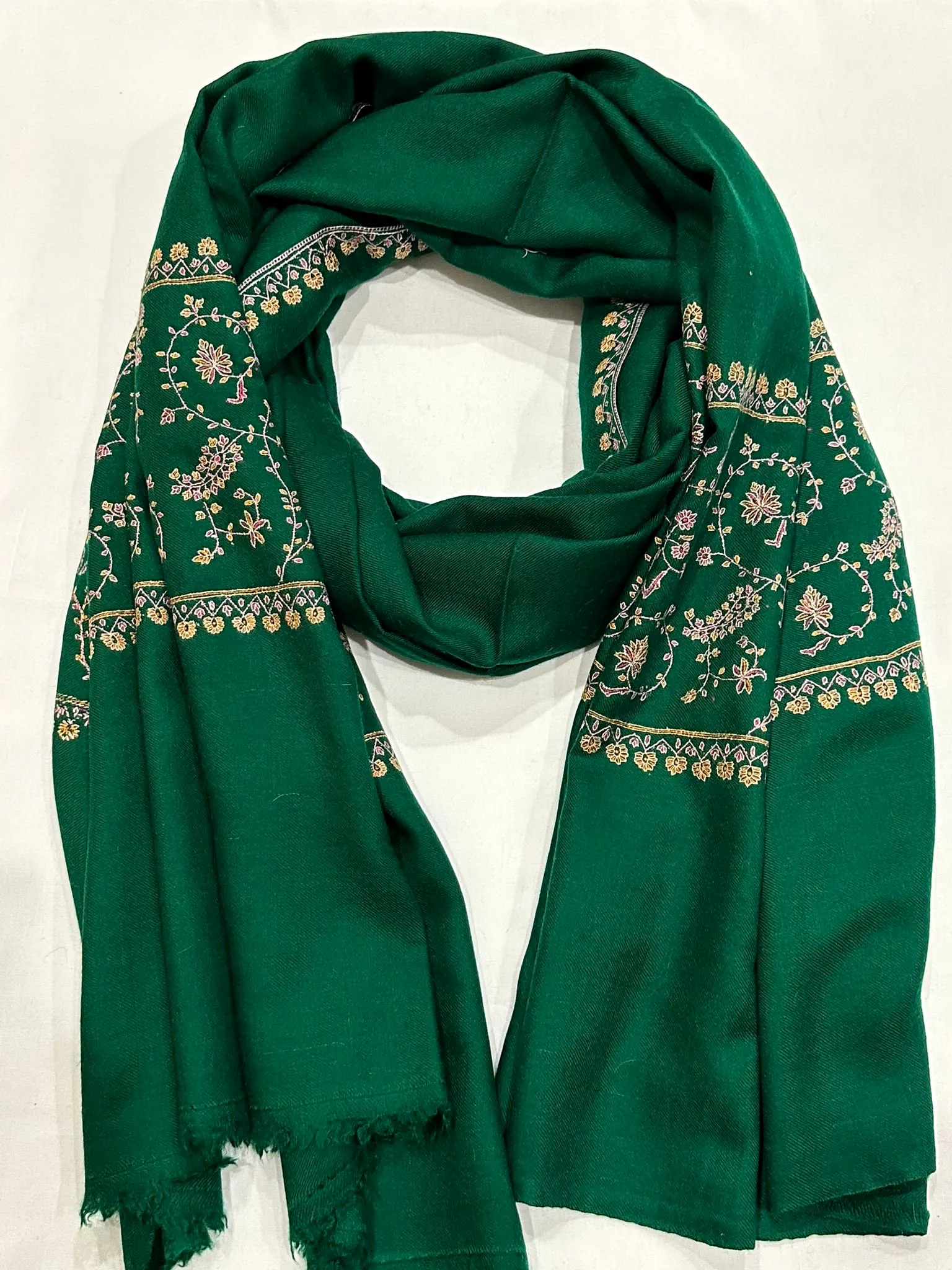 Emerald stole with tonal green needlework along the borders.