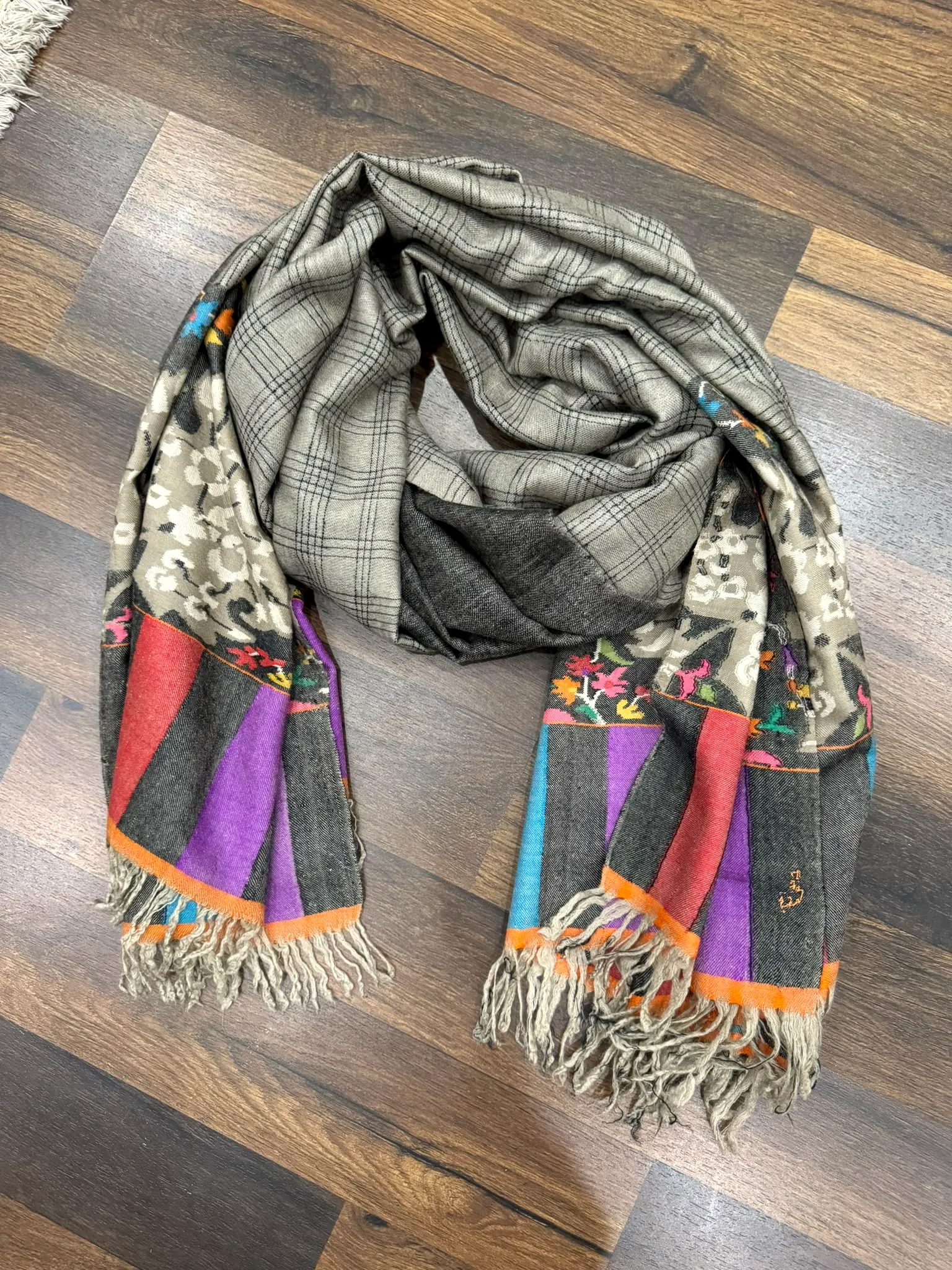 Kani stole in grey check with floral panels and purple, orange and green striped ends.