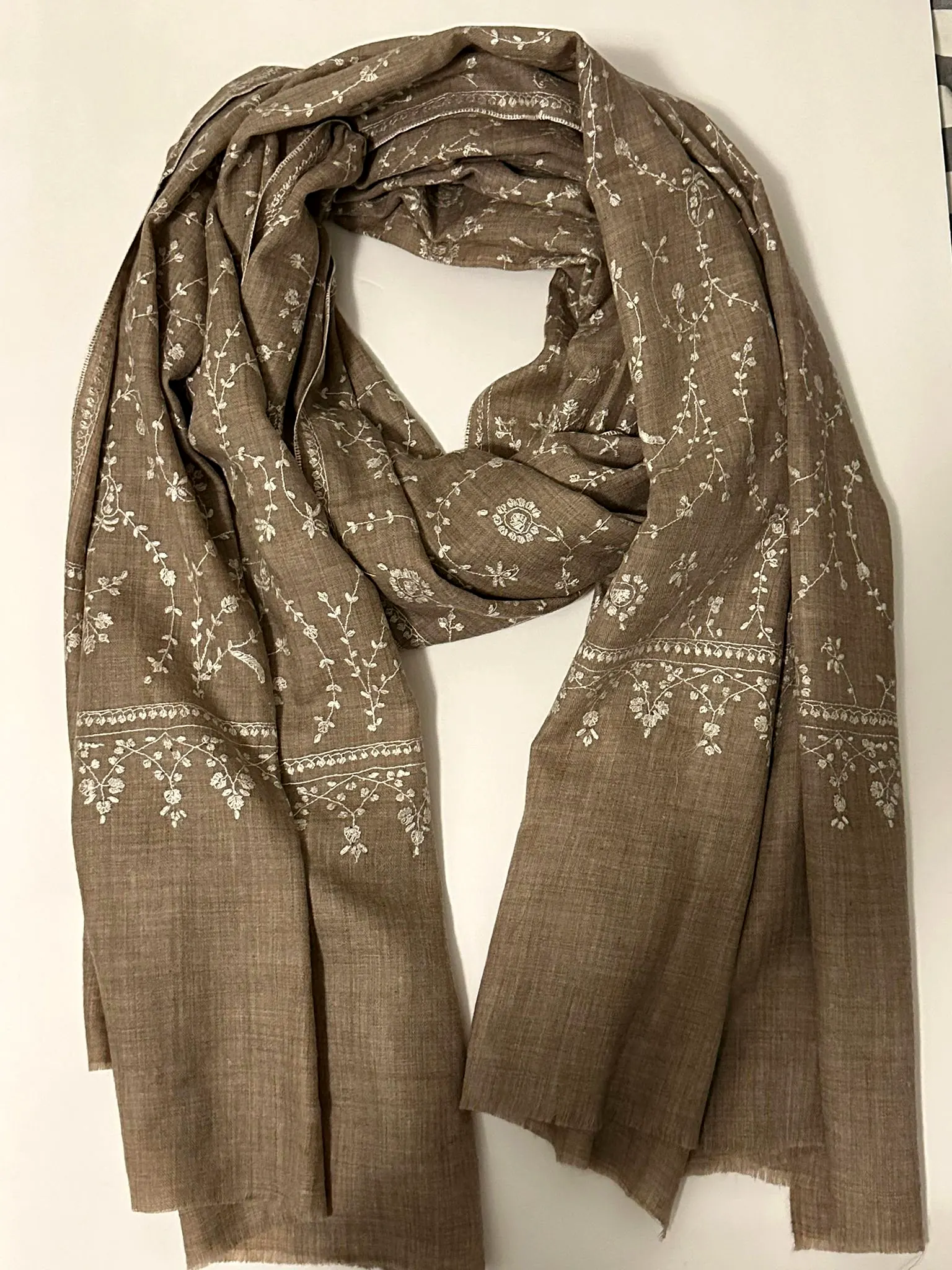 Taupe pashmina stole with bands of fine ivory floral needlework near both ends.